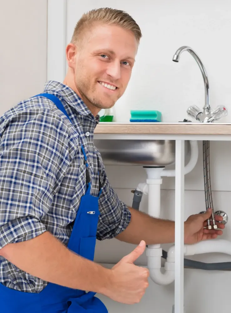 plumber-fixing-kitchen-sink